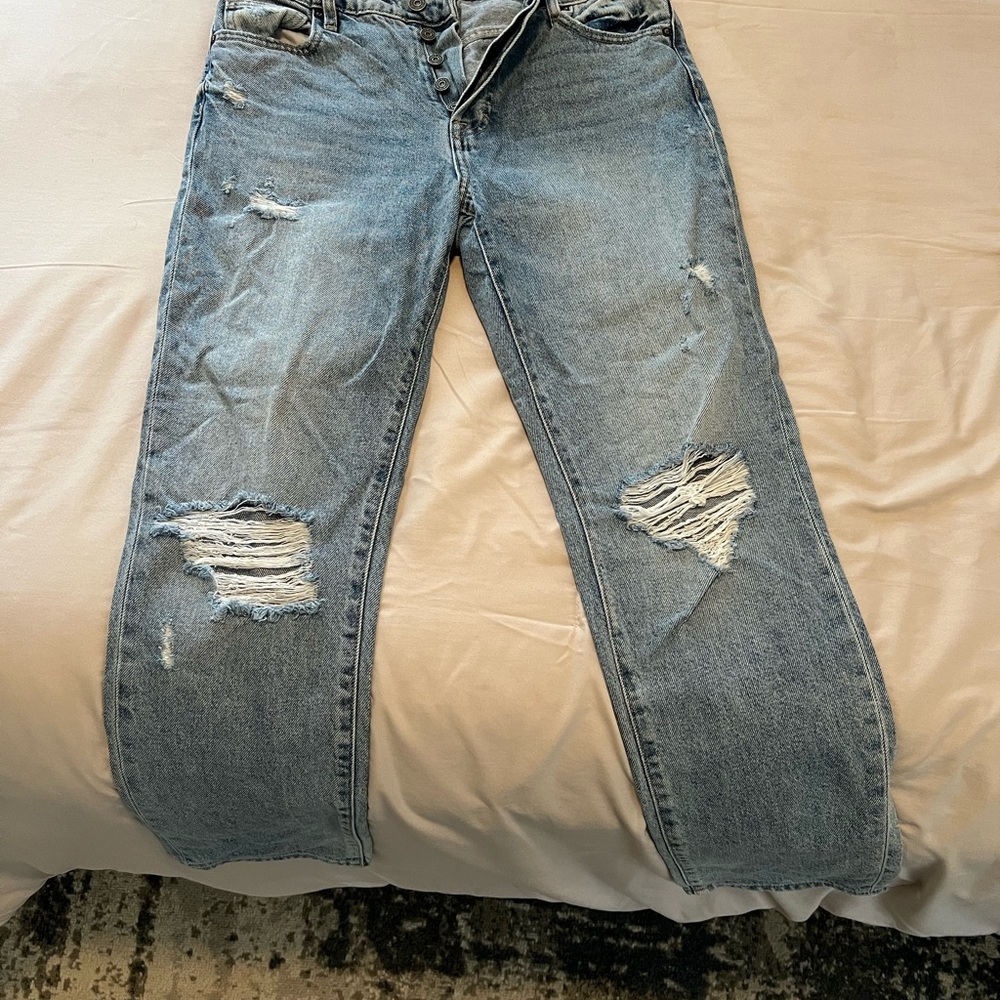 Distressed Blue Jeans